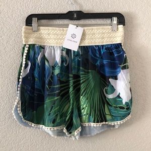 New with tags - elastic waist tropical print crochet detail shorts